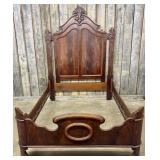 Antique Victorian Walnut Bed Frame Featuring A Hig