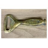Early Brass Coca-Cola Bottle Opener - 2.5"x5"