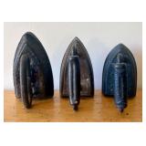 Trio of Antique Cast Iron Sad Irons including Acme
