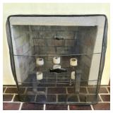A Set of Wrought Iron Fireplace Accessories includ