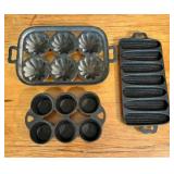 A Trio of American Vintage Cast Iron Baking Pans i