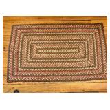 Rectangular Multi-Color Braided Fabric Rug in Prim