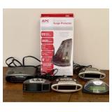 An Assortment of Electronics Including an APC Surg