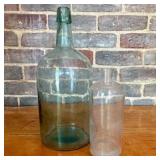 Two Antique Glass Bottles Including a Large Aqua D