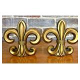 A Pair of Silvestri Gold Tone Fleur-de-Lis Bookend