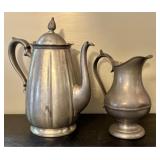 A Pair of Flagg & Homan Pewter Tea Service Pieces