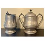 A Pair of Flagg and Homan Pewter Creamer and Lidde