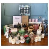 An Assortment of Wax and Flameless Candles with De
