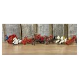 A Group of Horse-Drawn Fire Department Toys in the
