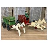 A Group of Vintage Circus Wagons and Horse Teams i