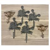 Six Vintage Cast Iron Wall Mounted Hooks in Equest