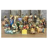 A Collection of Twenty-Eight Cast Resin African Am