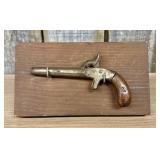 Percussion Single-Shot Pocket Pistol Mounted for D