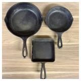 A Trio of Cast Iron Skillets by Lodge and Cracker