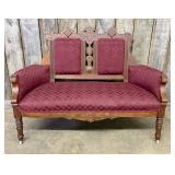 Victorian Eastlake Carved Walnut Settee with Burgu