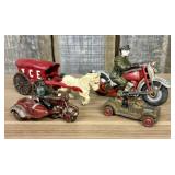 A Collection of Vintage Cast Iron Vehicles Includi