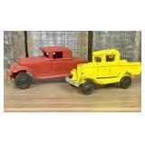 A Pair of Cast Iron Toy Vehicles in the Style of A