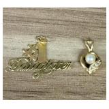 Two 14 Karat Yellow Gold Pendants (App. 1")
