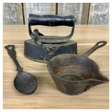 A Trio of Miniature Cast Iron Toy Utensils and Hin