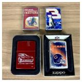 An Assortment of Four Windproof Pocket Lighters In