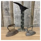 A Trio of Antique Cast Iron Items Including a Deco