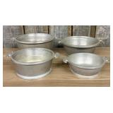 A Set of Four Graduated Cast Aluminum Nesting Bowl
