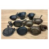 An Assortment of Vintage Miniature Cast Iron House
