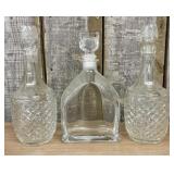A Trio of Glass Spirit Decanters Including a Pair