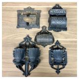 A Group of Five Victorian Cast Iron Wall Mounted M