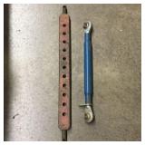 A Pair of Tractor Hitch Components Including Multi