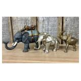 A Trio of Vintage Metal Elephant Figurines Includi