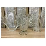 A Trio of Vintage Clear Glass Water Pitchers