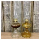 A Pair of Plume and Atwood Glass Kerosene Lamps wi