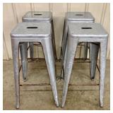 A Set of Four Industrial Distressed Metal Backless