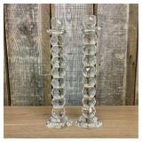 A Pair of Tall Faceted Stacked Crystal Taper Candl
