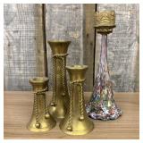 A Set of Four Decorative Candlesticks Including Mu