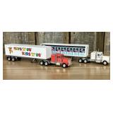 A Pair of Lionel Die-cast Semi-Tractor Trailers wi