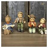 A Set of Four Goebel M.I. Hummel Hand-Painted Cera