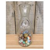 A Collection of Vintage Glass and Clay Marbles in