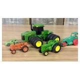 Five Toy Vehicles Including Ertl John Deere Tracto