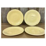 A Set of Four Homer Laughlin Fiesta Yellow Dinner