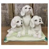 A Trio of Italian Majolica Porcelain Puppies on a