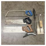 An Assortment of Vintage Hand Saws and Finishing T