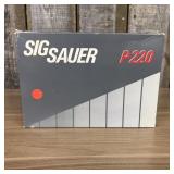 A Group of Sig Sauer P220 Factory Packaging and Pa
