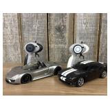Two Auldey Remote Controlled Toy Cars with Transmi