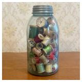 An Assortment of Vintage Wooden Thread Spools in a