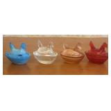 A Collection of Four Glass Hen on Nest Miniature S