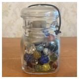 A Collection of Vintage Glass and Clay Marbles in