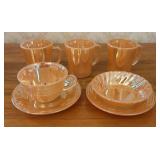 A Collection of Fire-King Peach Lustre Oven Resist