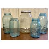 An Assortment of Vintage Blue Glass Ball and Atlas